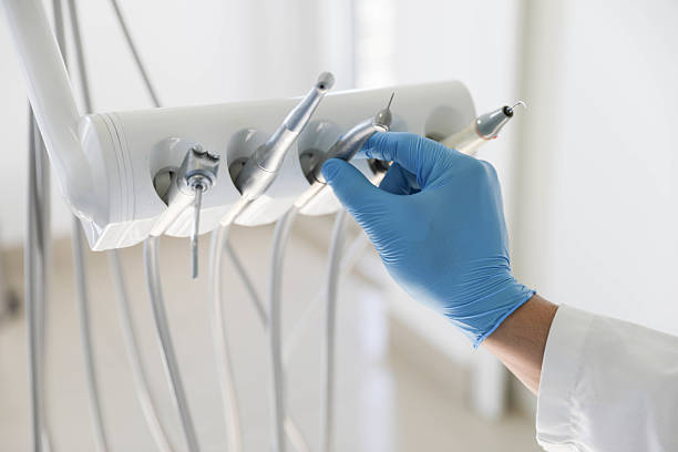 Professional Tooth Extraction technician working in Lockhart, FL